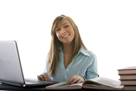 Our editors explain APA style and how to use APA formatting. A female student is sitting at a desk. There is a laptop computer in front of her, as well as an APA style book.