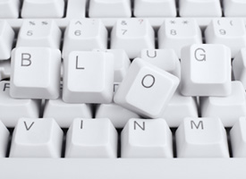 Our editors offer helpful editing and proofreading tips to bloggers. There is a photograph of a computer keyboard and blog is spelled out on top of the keyboard.