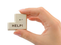 A Microsoft Office 2010 Review. A woman's hand holding a help button.