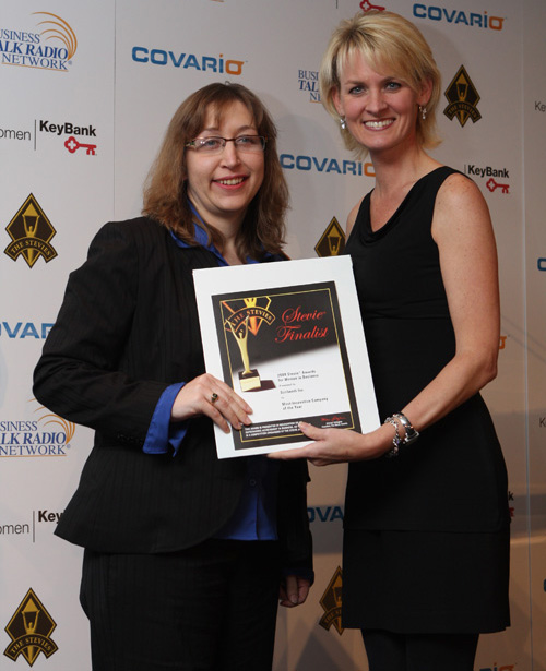 Scribendi.com President, Chandra Clarke, receives her finalist award from Carolyn Kepcher, former Executive Vice President of The Trump Organization