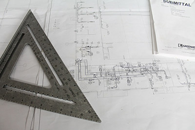 Construction blueprints on a table.
