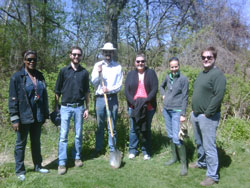 Scribendi.com staff planted 150 trees at Paxton’s Bush in Chatham. Scribendi.com staff stand with shovels outside of Paxton’s Bush in Chatham after planting 150 trees.