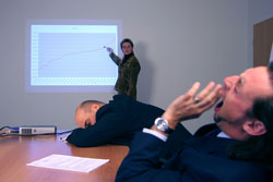 Our editors highlight effective ways to use PowerPoint to enhance your presentation. Two bored men listening to a PowerPoint presentation in an office.