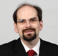 Oxford grad Terence Johnson joins the Scribendi.com team as vice-president. A headshot of Scribendi.com vice-president Terence Johnson. He is wearing a suit and glasses.