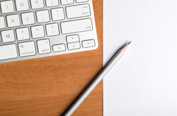 A keyboard and pencil photo.