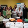 Scribendi.com Donates 192 T-Shirts to Charity